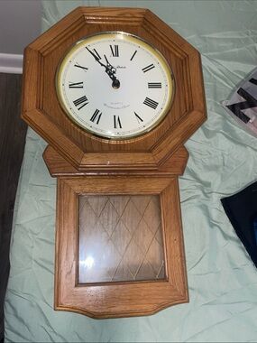 Oak Wall Clock with White Face and Roman Numerals